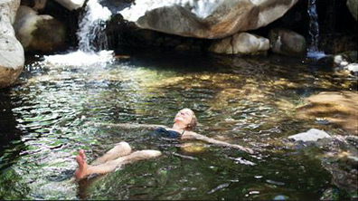 Woman relaxing in the Tassajara hot spring