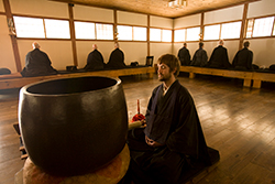 Tassajara meditation hall with zazen meditators
